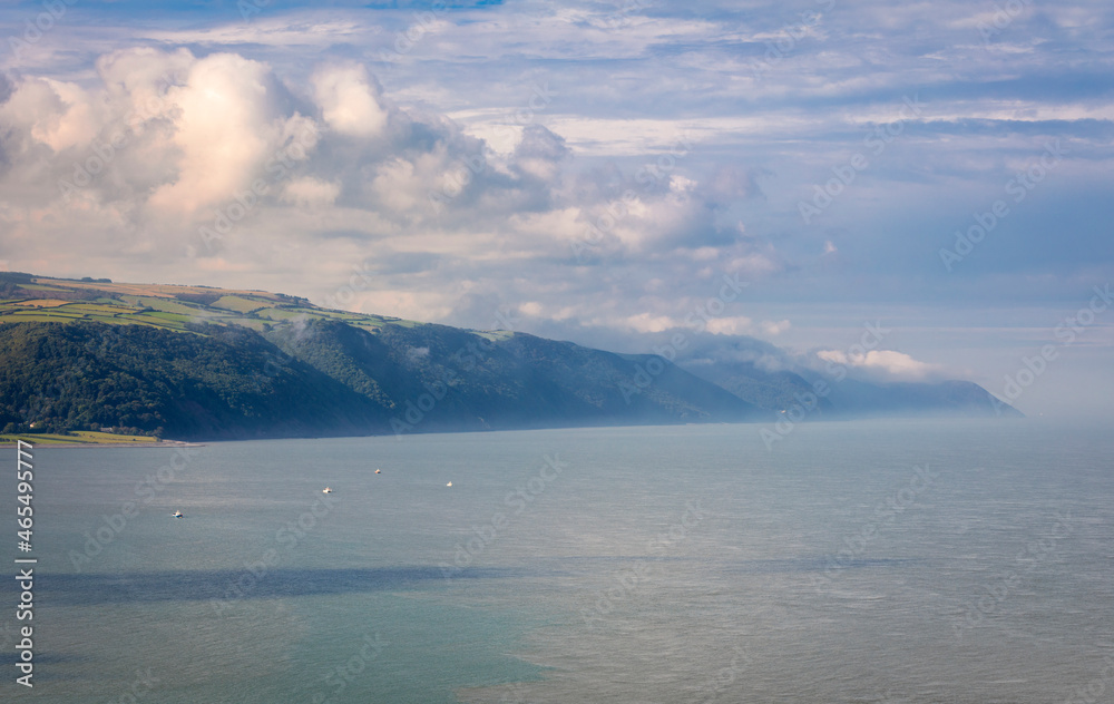 Fishing boats in Porlock bay from Bossington Hill, Exmoor, Somerset south west England UK