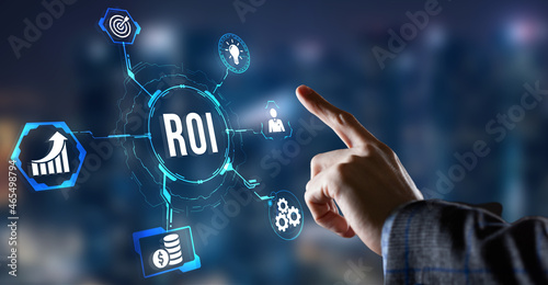 Internet, business, Technology and network concept. ROI Return on investment financial growth concept. Virtual button.