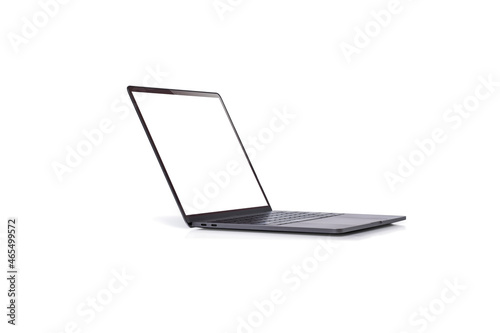 Laptop space gray with blank screen isolated on white background.side view