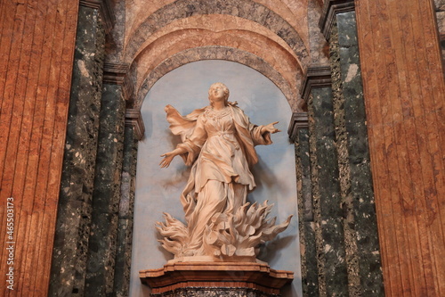 Saint Agnes on the Pyre Statue in the Sant'Agnese in Agone Church in Rome, Italy photo