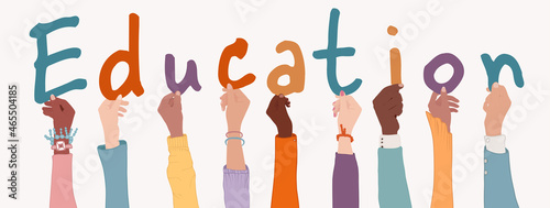 Raised arms of diverse multi-ethnic and multicultural people holding colorful letters forming the word -Education-. Male and female students. University. Education concept