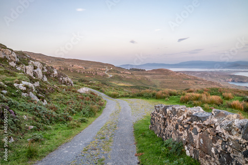 The coastal single track road between Meenacross and Crohy Head south of Dungloe, County Donegal - Ireland photo