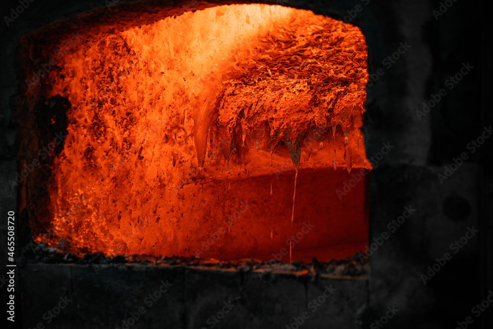 aluminum smelter - furnace - melting - close-up to the inside of the furnace