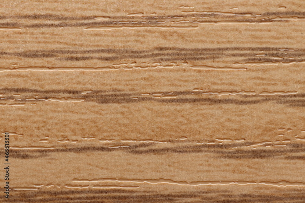 PVC plastic texture with wood pattern for edging chipboard ends. Texture of decorative wood backgrounds. PVC plastic texture with wood pattern for edging chipboard ends. Texture of decorative wood backgrounds.