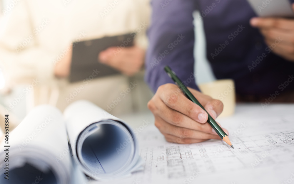 Architect working on blueprint. Architects workplace - architectural ...