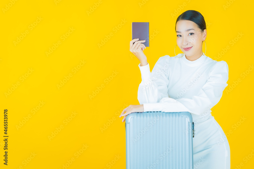Portrait beautiful young asian woman with luggage bag and passport Portrait beautiful young asian woman with luggage bag and passport