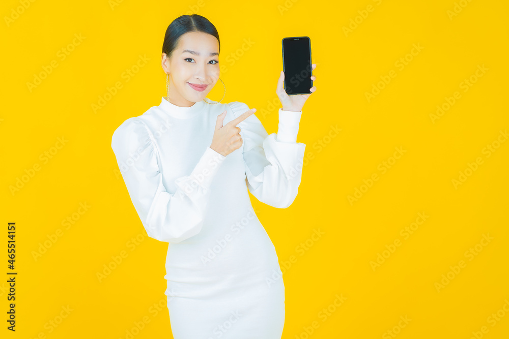 Portrait beautiful young asian woman smile with smart mobile phone Portrait beautiful young asian woman smile with smart mobile phone