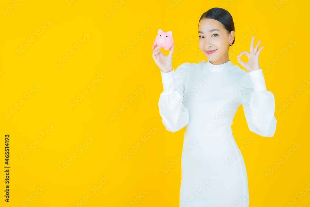 Portrait beautiful young asian woman with piggy bank Portrait beautiful young asian woman with piggy bank