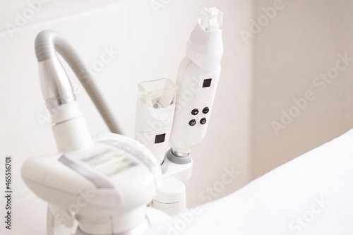 Quadro su tela Closeup  vacuum roller massage apparatus for face and body on medical cabinet background with copy space