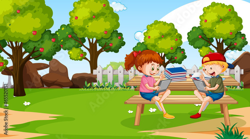Kids leaning online with tablet in the park