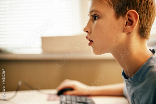 boy kid cyber gamer playing online. cyber sport esports concept