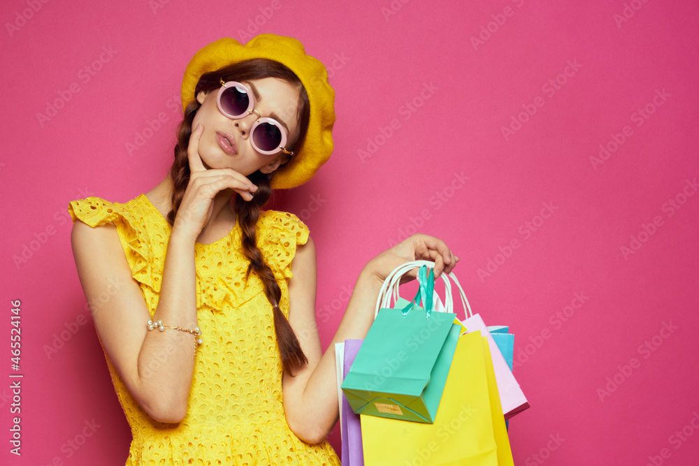 smiling woman with multicolored bags posing isolated background smiling woman with multicolored bags posing isolated background
