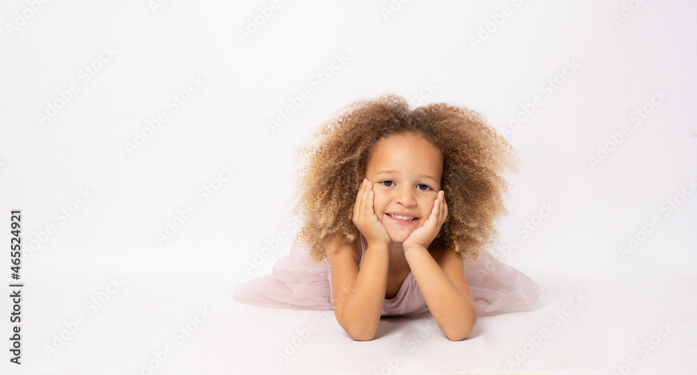 Beautiful little ballerina over a white background Beautiful little ballerina over a white background