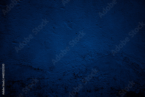 fond ou texture abstraite de mur de béton bleu nuit