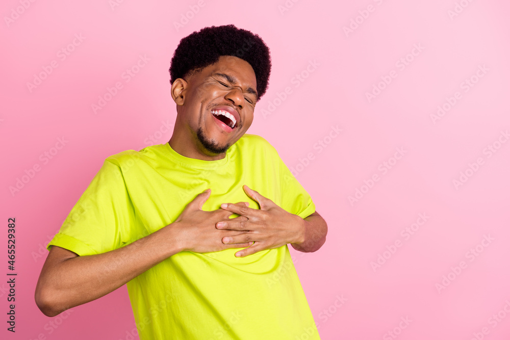 Photo of cheerful young afro american joyful man laugh good mood enjoy isolated on pink color background Photo of cheerful young afro american joyful man laugh good mood enjoy isolated on pink color background