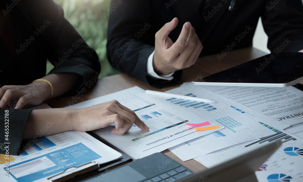 Fund managers team consultation and discuss about analysis Investment stock market by digital tablet. Fund managers team consultation and discuss about analysis Investment stock market by digital tablet.