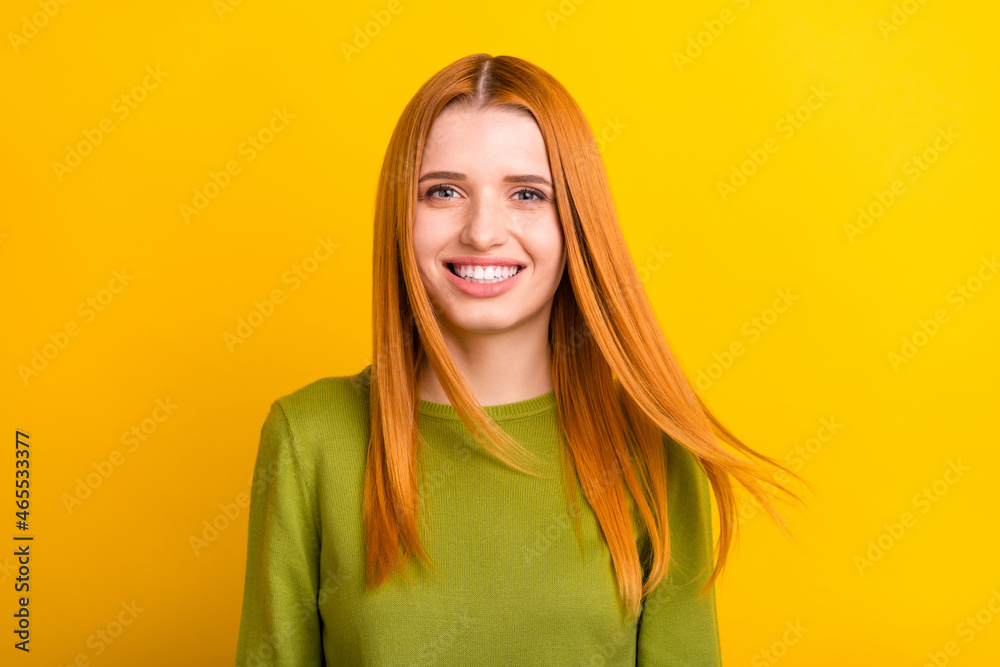Photo of lovely orange hair young lady blow wind wear green sweater isolated on yellow color background Photo of lovely orange hair young lady blow wind wear green sweater isolated on yellow color background