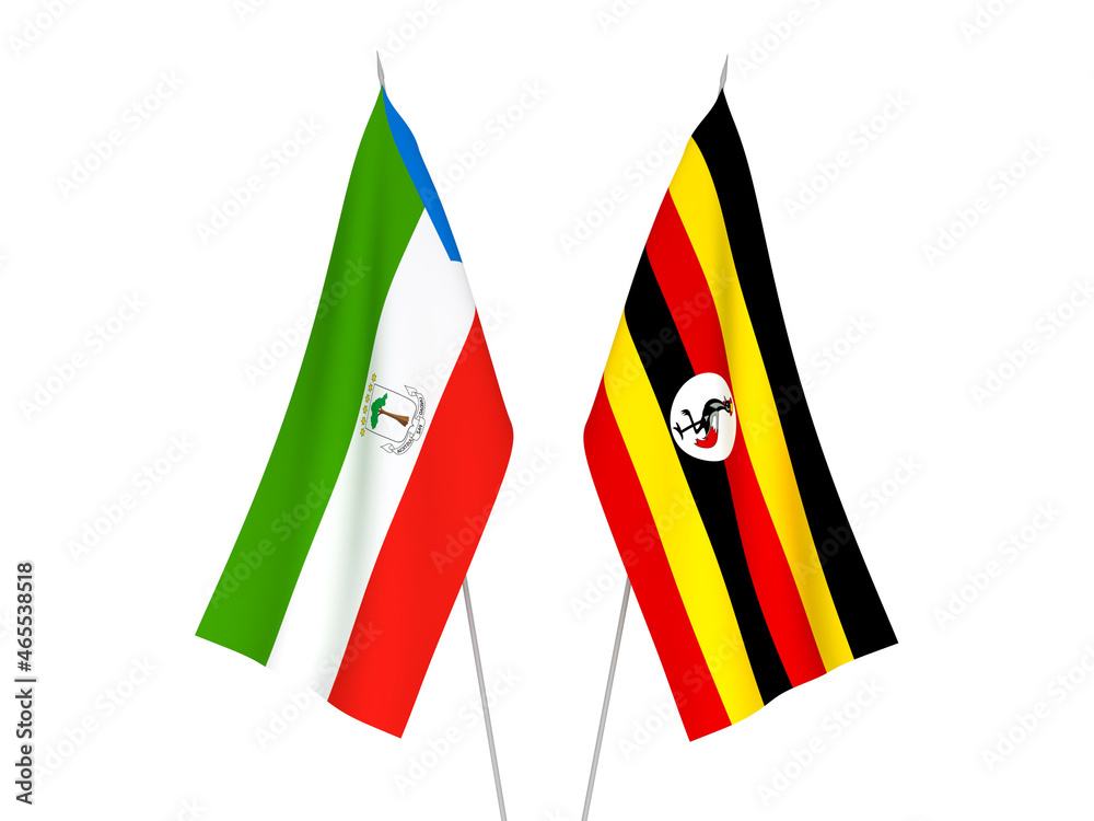 National fabric flags of Uganda and Republic of Equatorial Guinea isolated on white background. 3d rendering illustration. National fabric flags of Uganda and Republic of Equatorial Guinea isolated on white background. 3d rendering illustration.