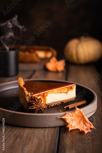 Piece of sweet pumpkin cheesecake with spices