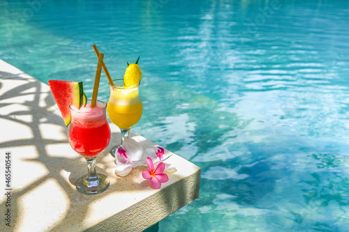 Canvas Print Melon and pineapple drinks on the poolside in Lombok, Indonesia