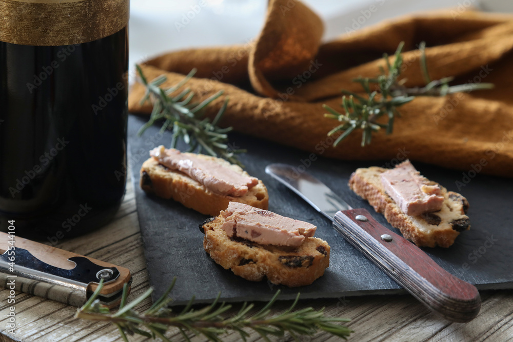 Foie gras and toasts on a rustic background Foie gras and toasts on a rustic background
