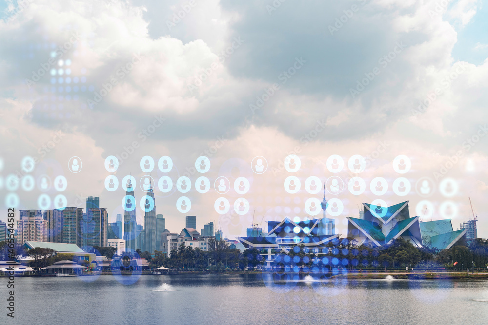 Social media icons hologram over panorama city view of Kuala Lumpur, Malaysia, Asia. The concept of people networking, connections and career opportunities. Double exposure.