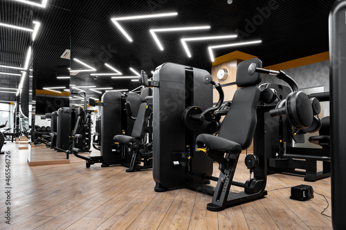 Modern gym interior with new fitness equipment