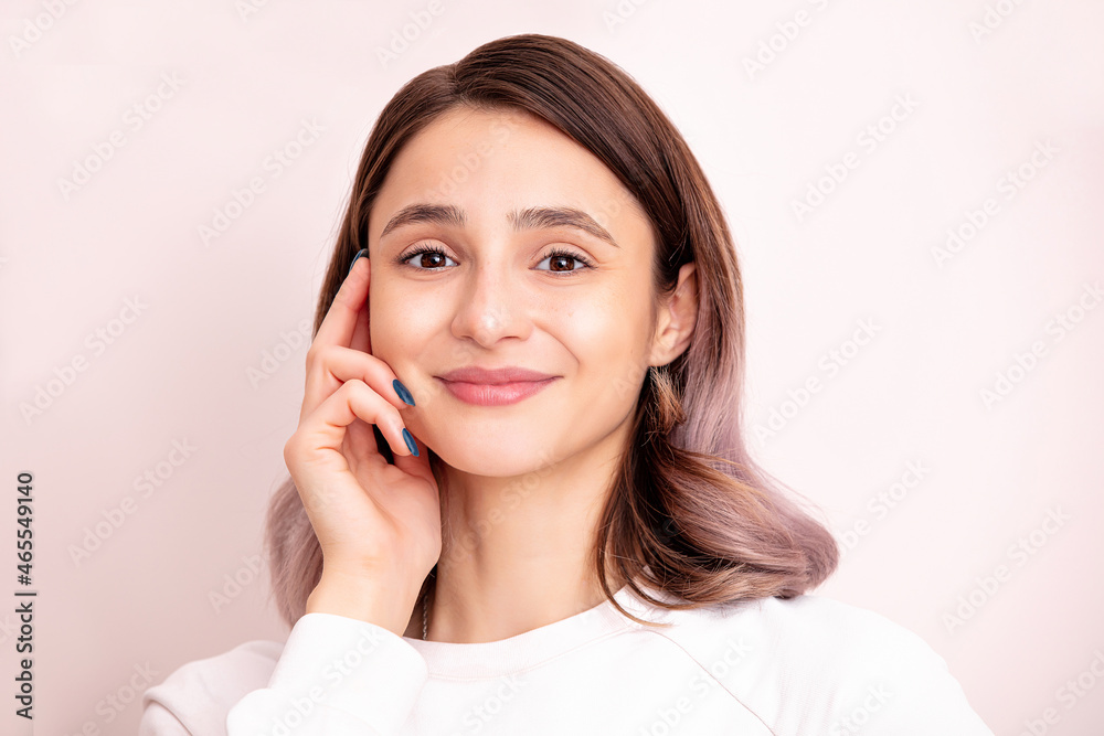Portrait of a young girl model beautiful and natural with emotions in the studio Portrait of a young girl model beautiful and natural with emotions in the studio