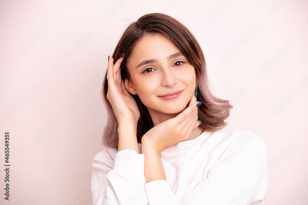 Portrait of a young girl model beautiful and natural with emotions in the studio Portrait of a young girl model beautiful and natural with emotions in the studio