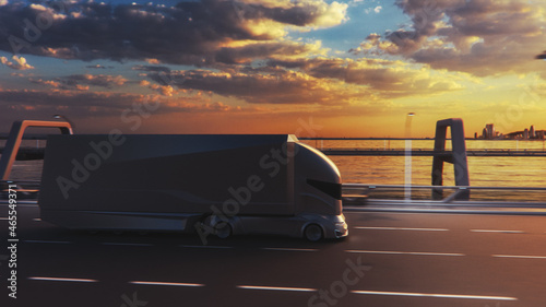 Futuristic Technology Concept: Autonomous Self-Driving Truck with Cargo Trailer Drives on the Road with Scanning Sensors. 3D Electric Lorry Driving Fast on Scenic Sunset Highway Bridge.