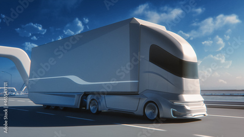 Futuristic Technology Concept: Autonomous Self-Driving Truck with Cargo Trailer Drives on the Road with Scanning Sensors. 3D Zero-Emissions Electric Lorry Driving Fast on Scenic Highway Bridge. © Gorodenkoff