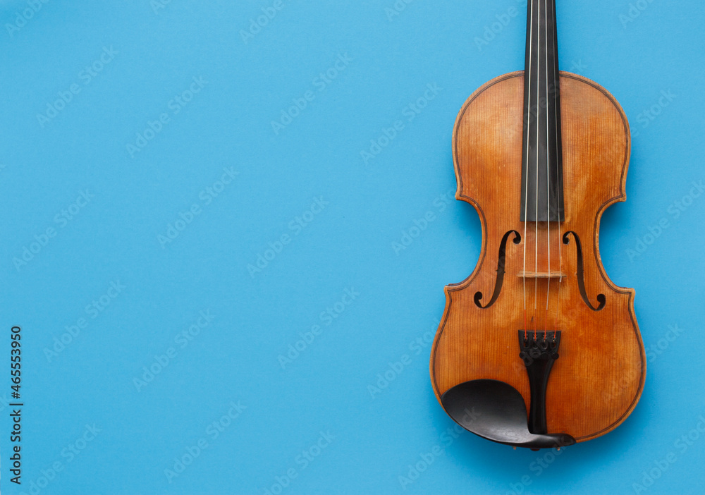 Classical music concert poster with brown color violin on blue background  with copy space for your text Stock Photo | Adobe Stock