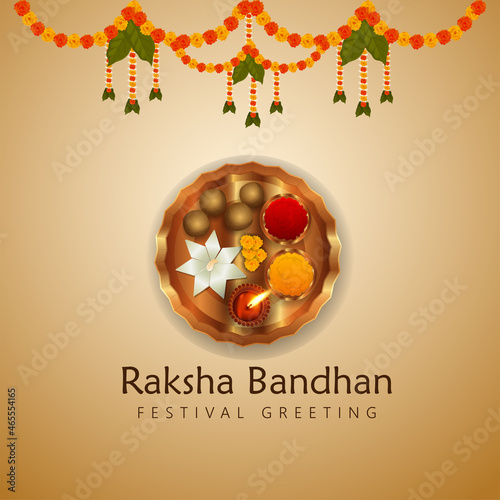 Happy rakhi indian festival celebration greeting card with creative pooja thali and garland flower