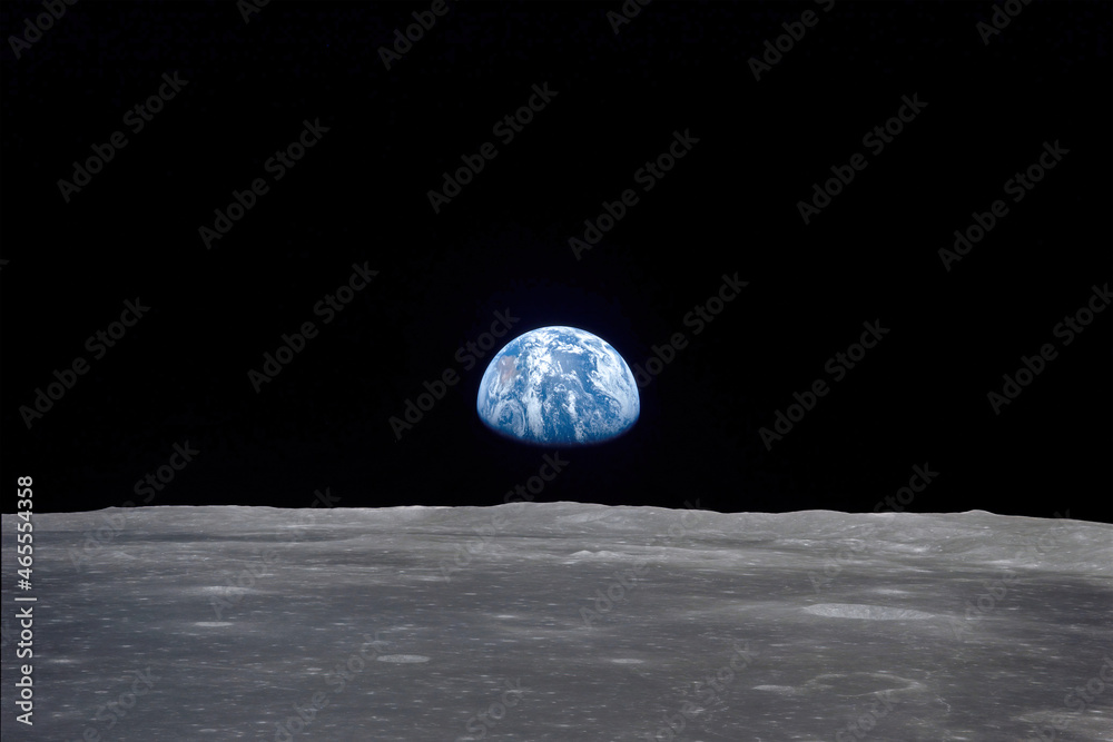 The 'Earthrise' seen from the moon. Digital enhancement. Elements of this image furnished by NASA - obrazy, fototapety, plakaty 