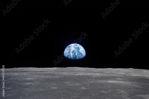 The 'Earthrise' seen from the moon. Digital enhancement. Elements of this image furnished by NASA photo