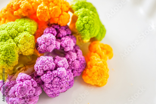 Colored cauliflower. Green, yellow and purple cauliflower heads