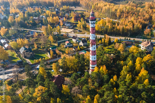 Aerial photography Osinovetsky Lighthouse is a lighthouse located in the village of Lake Ladoga. Beautiful autumn landscape. The concept of recreation in St. Petersburg.
