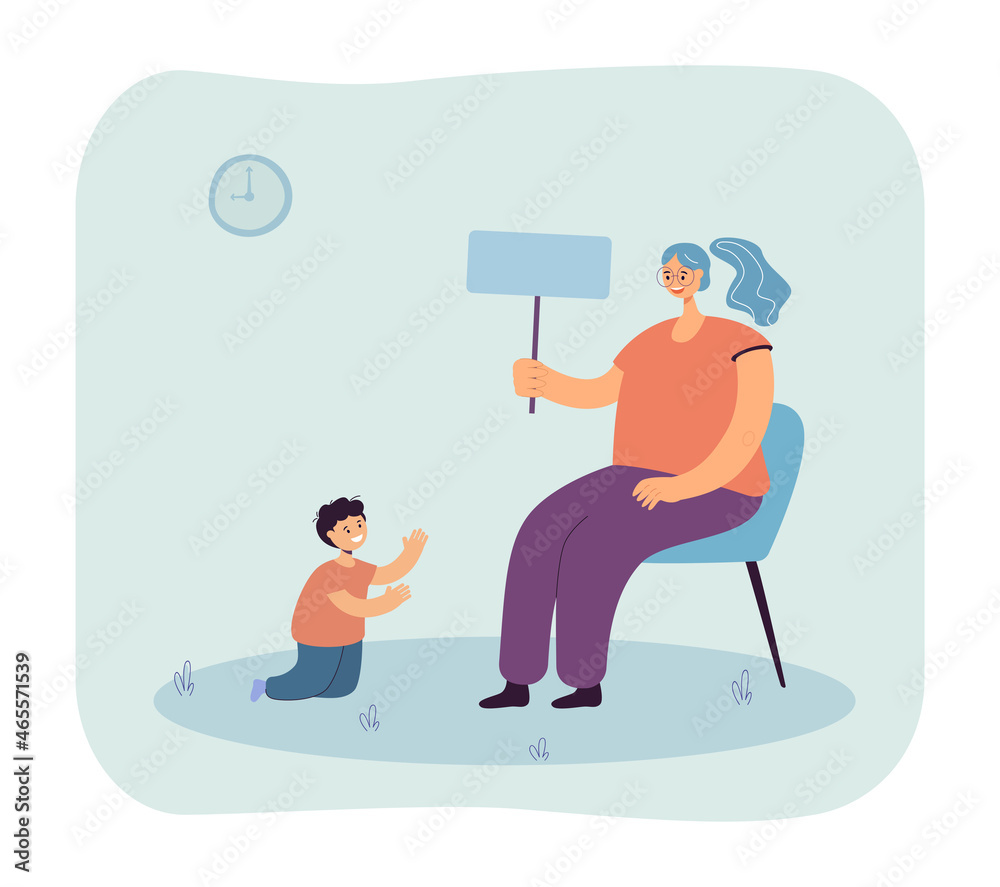 Young kindergarten teacher sitting on chair and playing with boy. Woman teaching child via game flat vector illustration. Upbringing and education concept for banner, website design or landing web