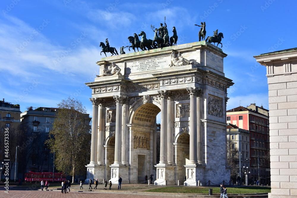 MILAN, DECEMBER 28, 2017 - The Arch of Peace (Arco della Pace) in a sunny winter day with blue sky - city gate in the centre of the Old Town of Milan, Sempione Park  