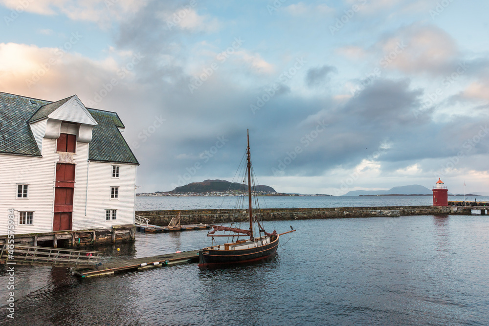 Traditional fishing boat moored in the harbour at Molovegen, Ålesund, Møre og Romsdal, Norway