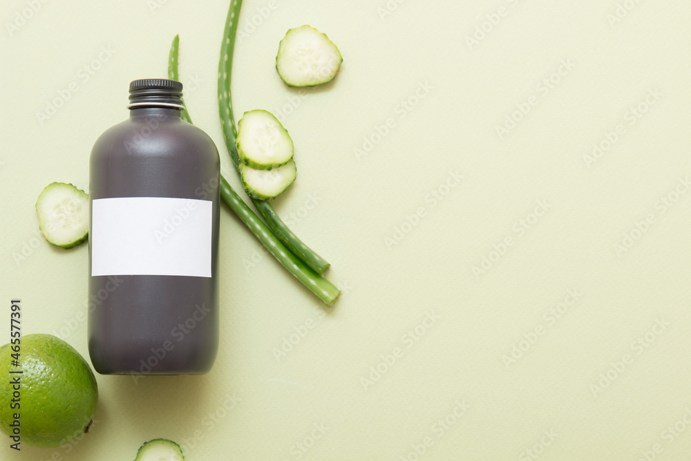 Natural cosmetic products with aloe vera on a light green background. Cosmetic jar mockup. Natural cosmetic products with aloe vera on a light green background. Cosmetic jar mockup.