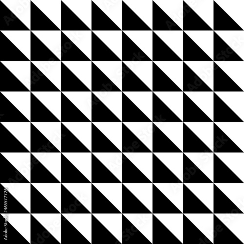 The triangles are black and white. Trendy seamless pattern for modern fabrics, textiles, decorative pillows, wrapping paper. 