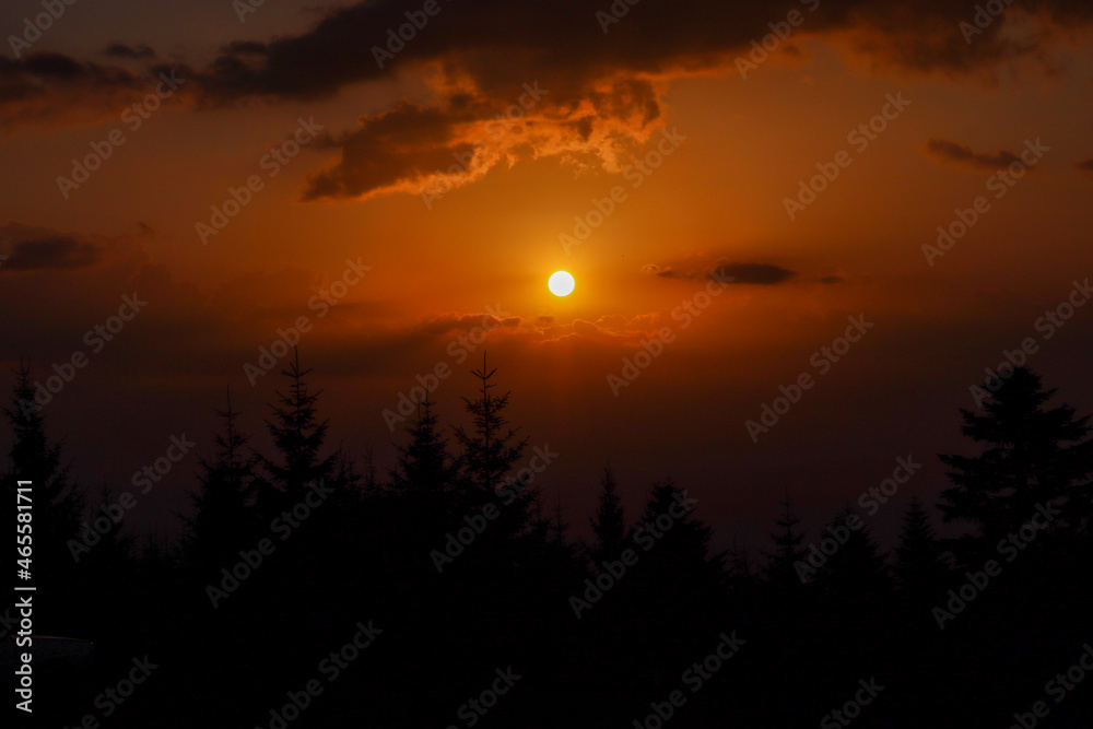 Obraz premium sunset over the river