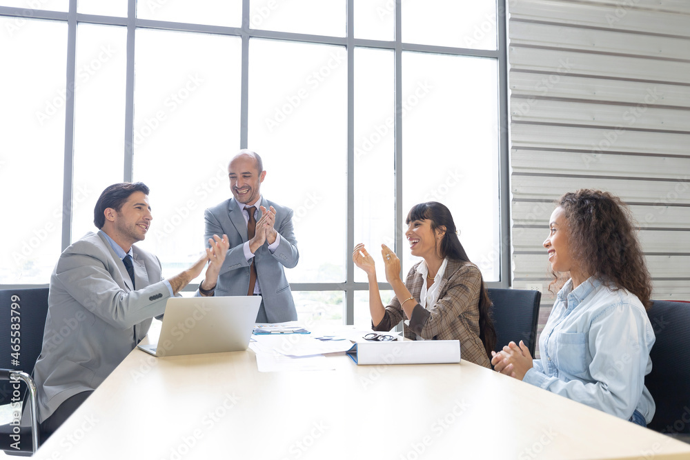 business people clapping hands together for success work in conference room business people clapping hands together for success work in conference room