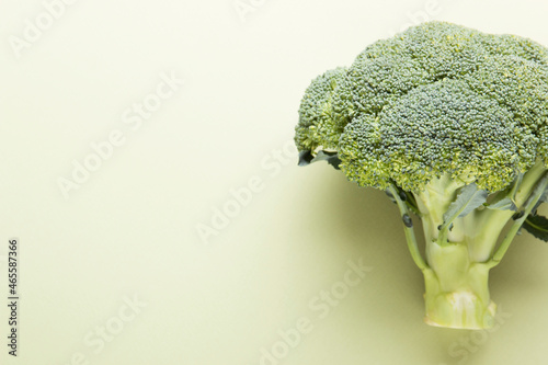 Broccoli vegetables on a green background. Asparagus cabbage.