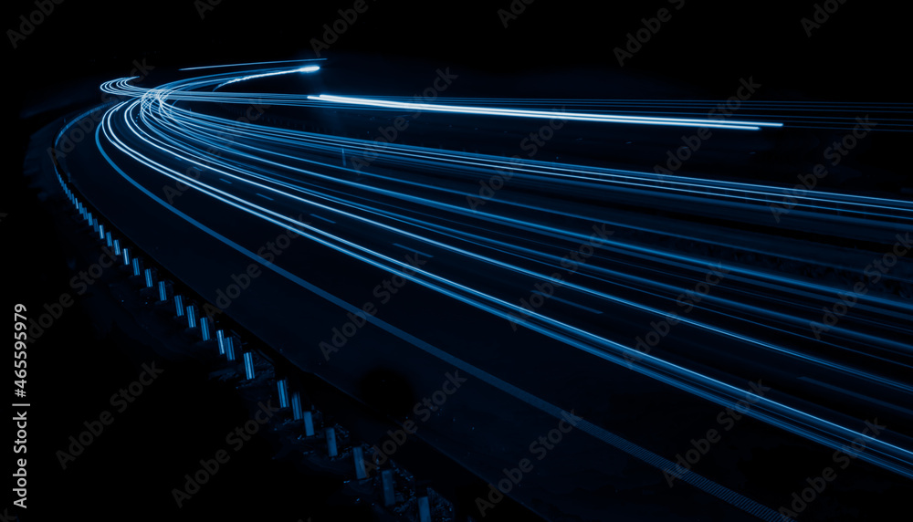 blue car lights at night. long exposure - obrazy, fototapety, plakaty 