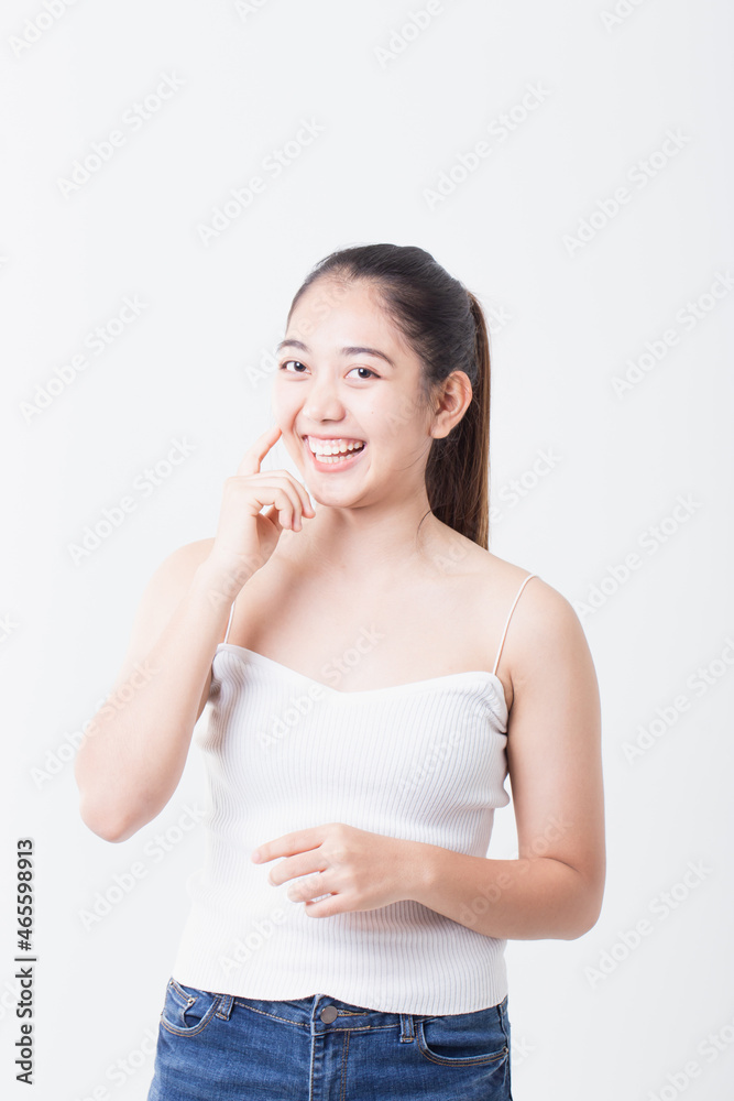 Asian woman is showing off pretty skin. Asian beauty skin care woman looking at side. Asian woman is showing off pretty skin. Asian beauty skin care woman looking at side.