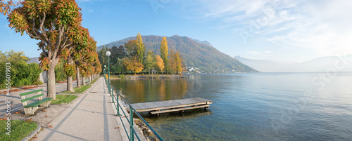 lakeside promenade Gmunden, autumnal landscape with trees and benches, Salzkammergut austria photo