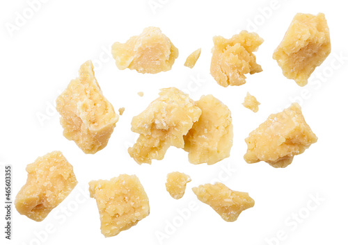Parmesan cheese drops on a white background, levitating cut parmesan. Isolated