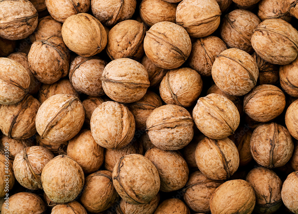 Walnuts in shell background. The view from top